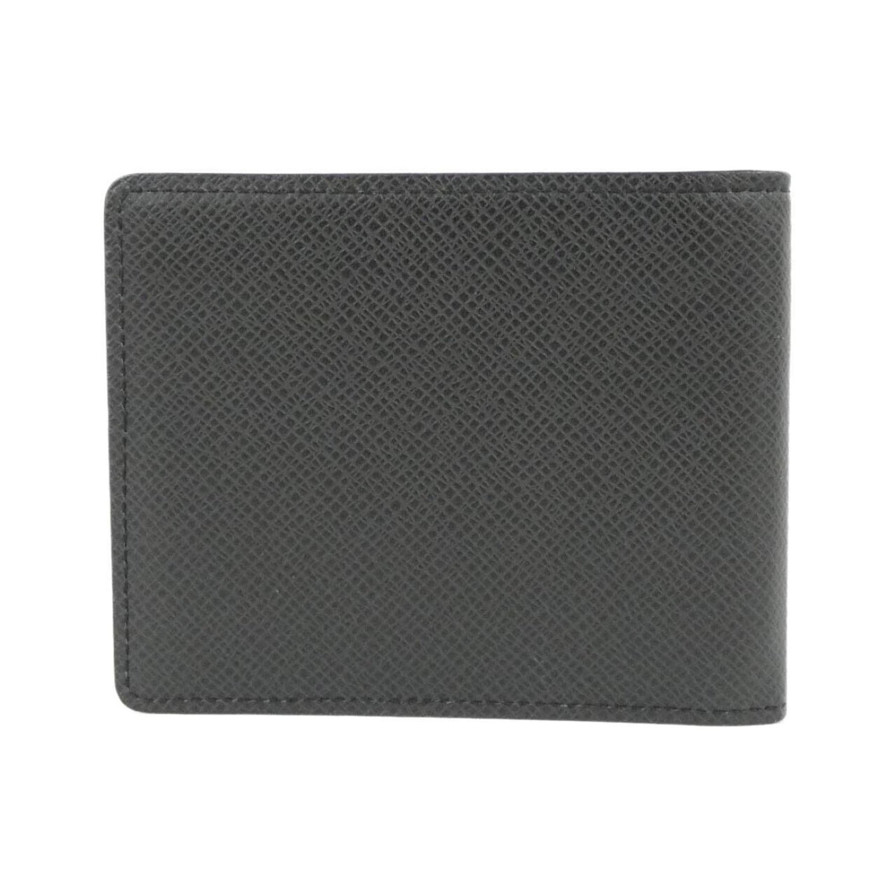 Louis Vuitton Taiga Portefeuille Pens Billfold