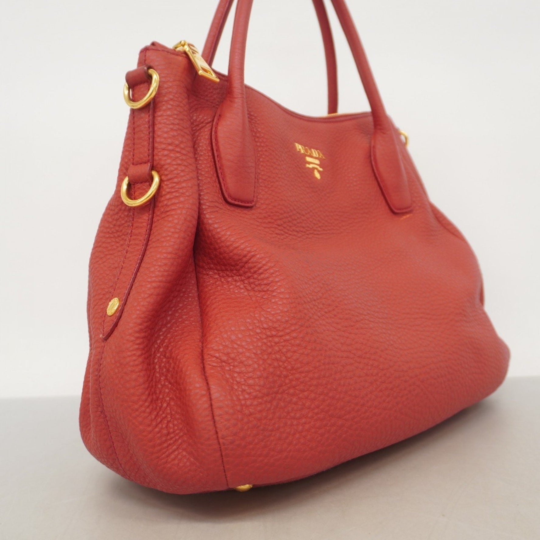 Prada handbag leather red