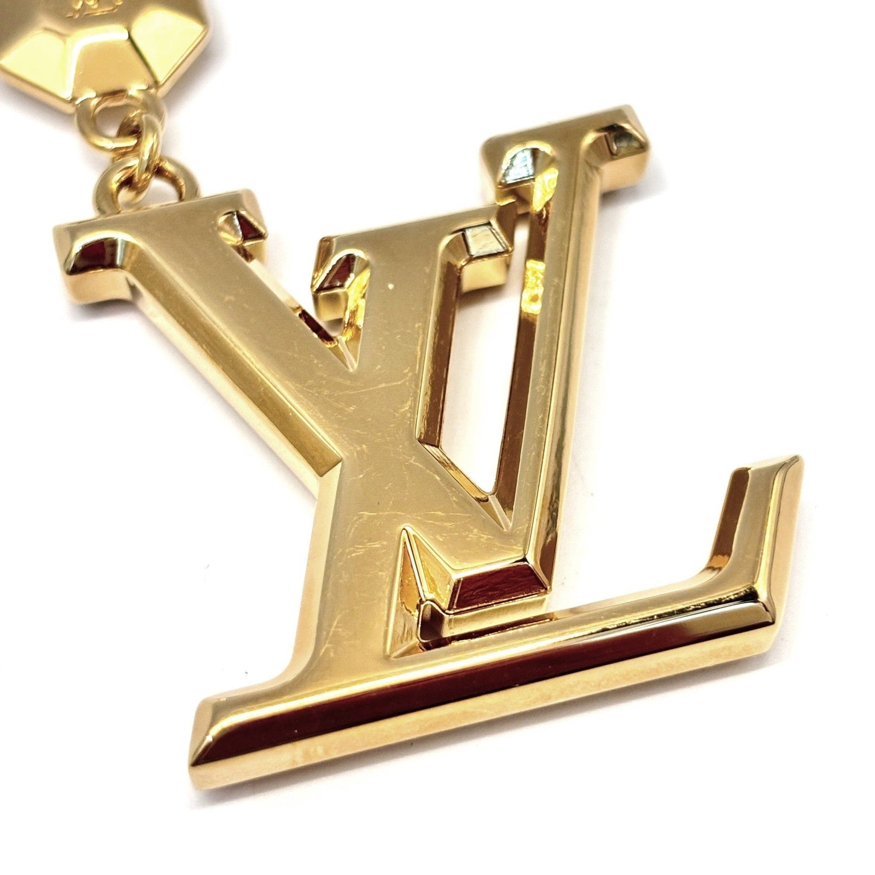 Louis Vuitton Facet Porte-Clés Keychain Unisex Gold