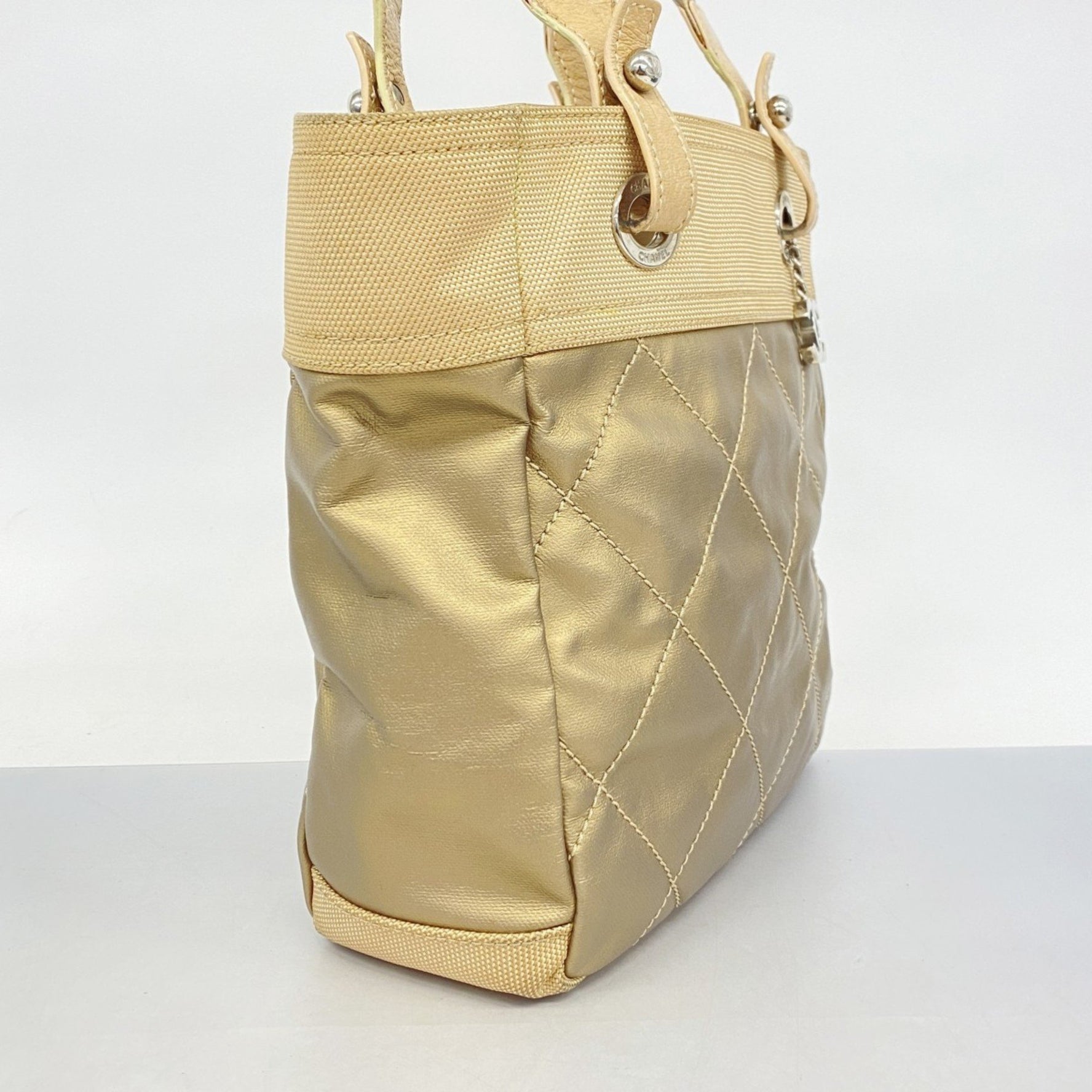 Chanel Paris-Biarritz canvas tote bag in beige and gold for women