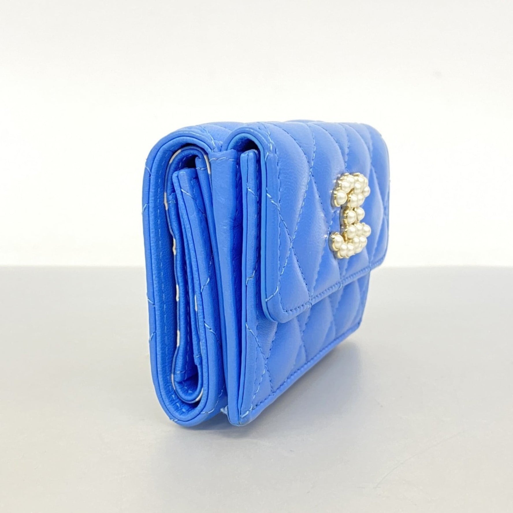 Chanel Matelasse Tri-fold Wallet in Lambskin Champagne