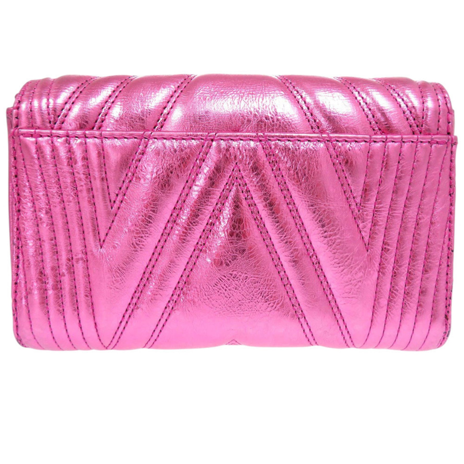 Like new MCM calfskin metallic pink shoulder bag with gold hardware and chain closure, model 0568