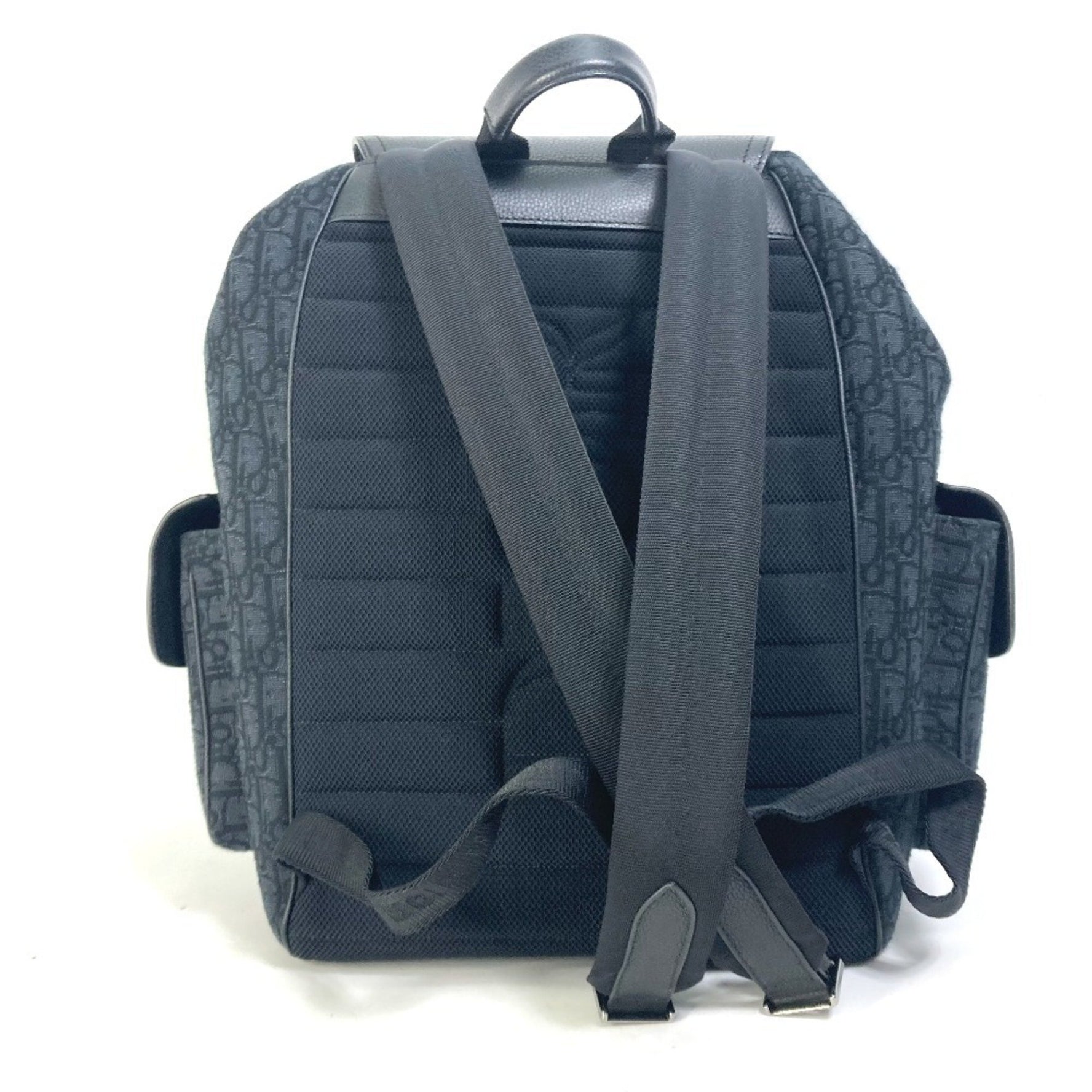 Christian Dior Dior Saddle Oblique Backpack in Navy Canvas and Leather.