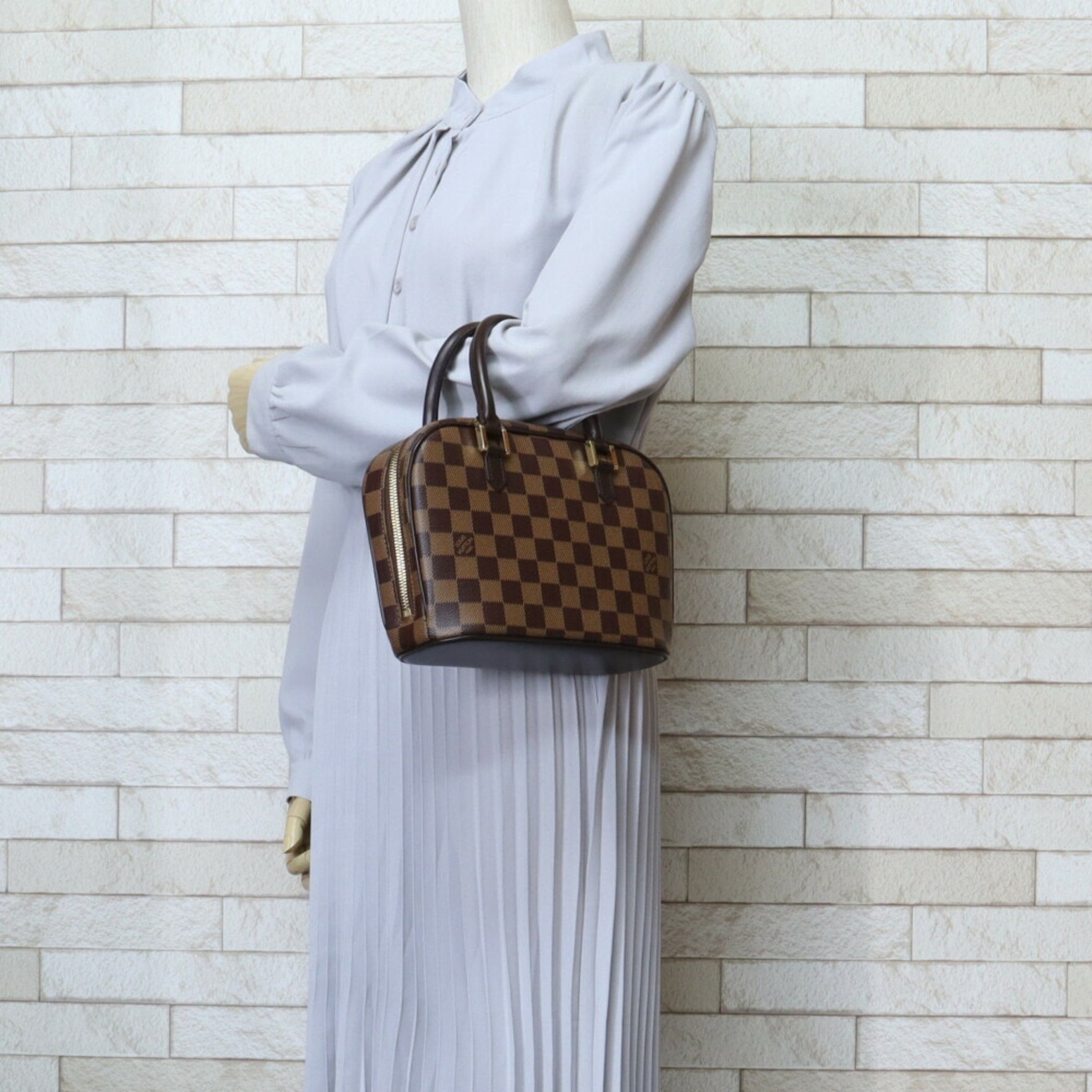 Louis Vuitton Saria Damier Handbag Canvas Brown