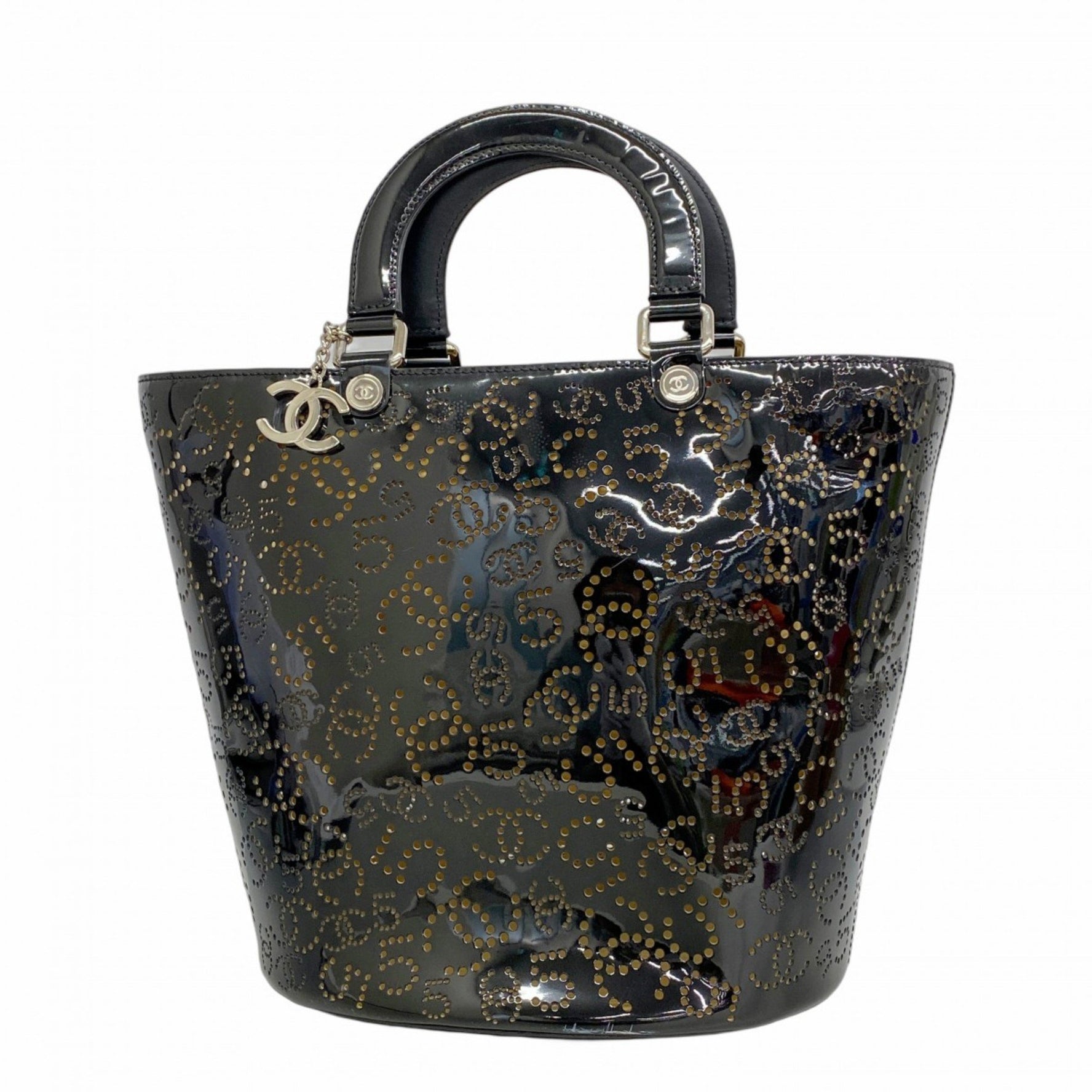 Chanel handbag in patent leather with perforation