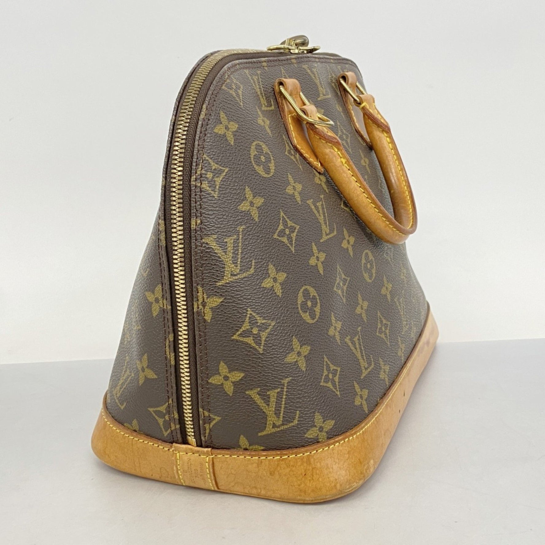 Louis Vuitton Monogram Alma Handbag