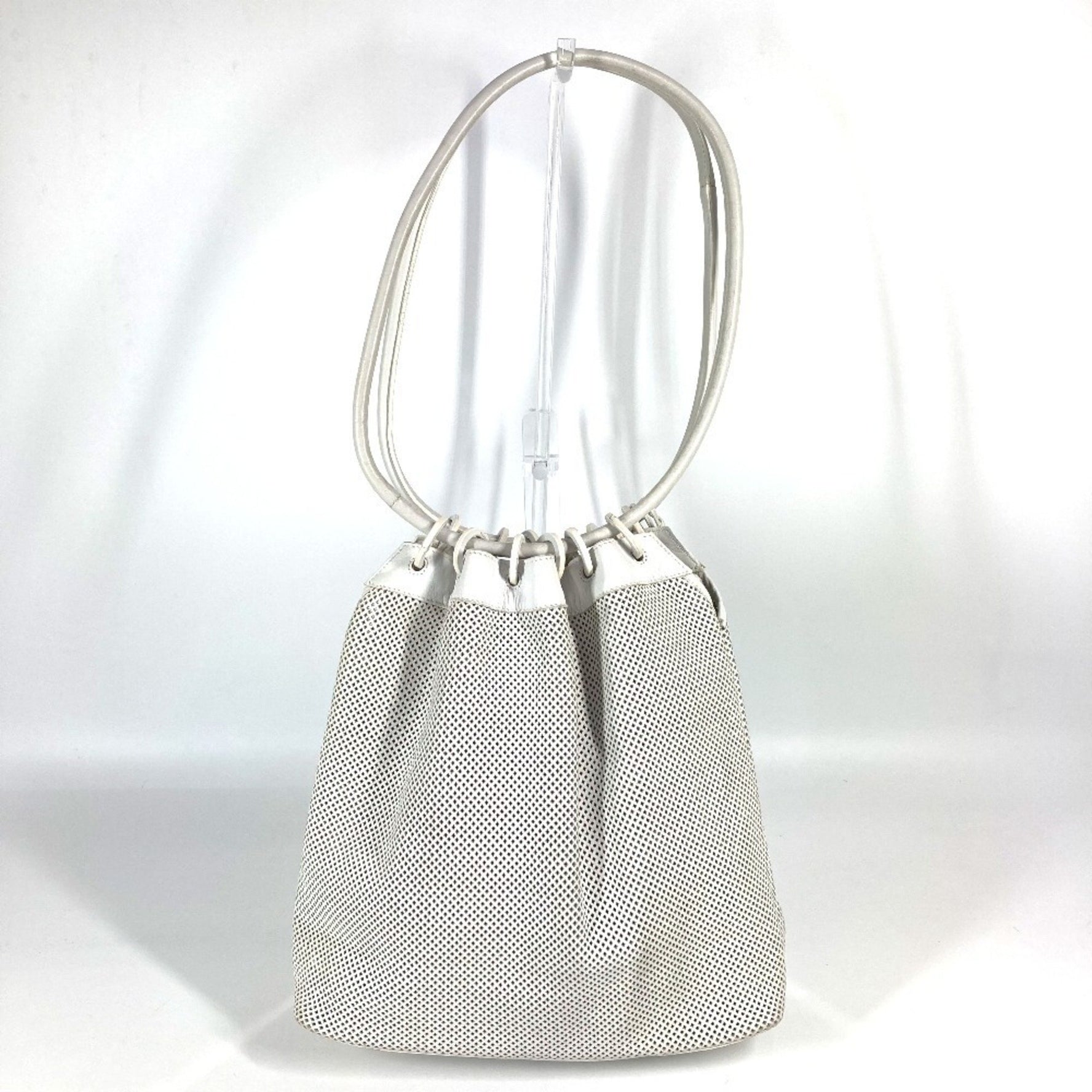 GUCCI Vintage Perforated Mesh Logo Drawstring Pouch Shoulder Bag in Leather