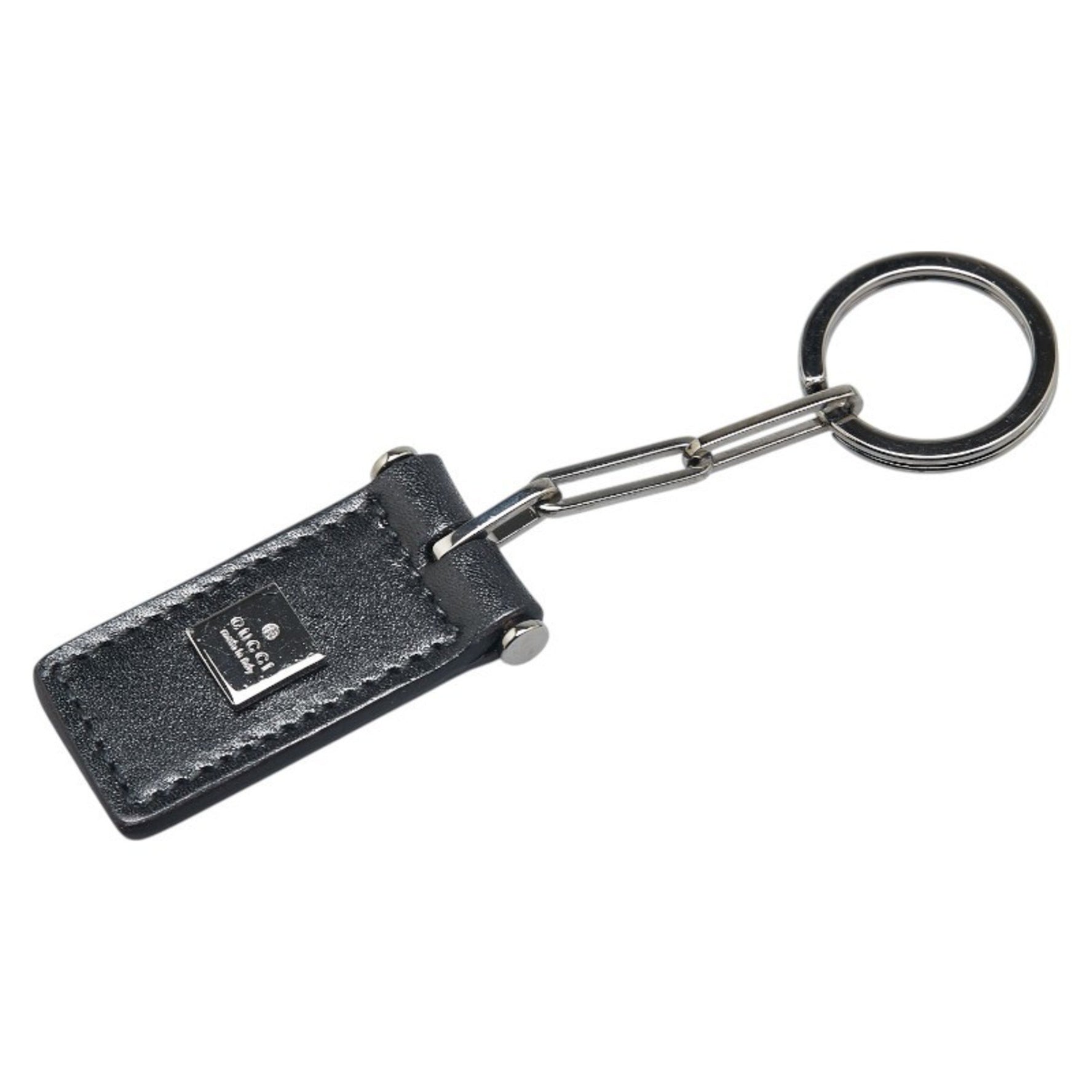 Gucci bag charm keychain in with silver hardware and leather.