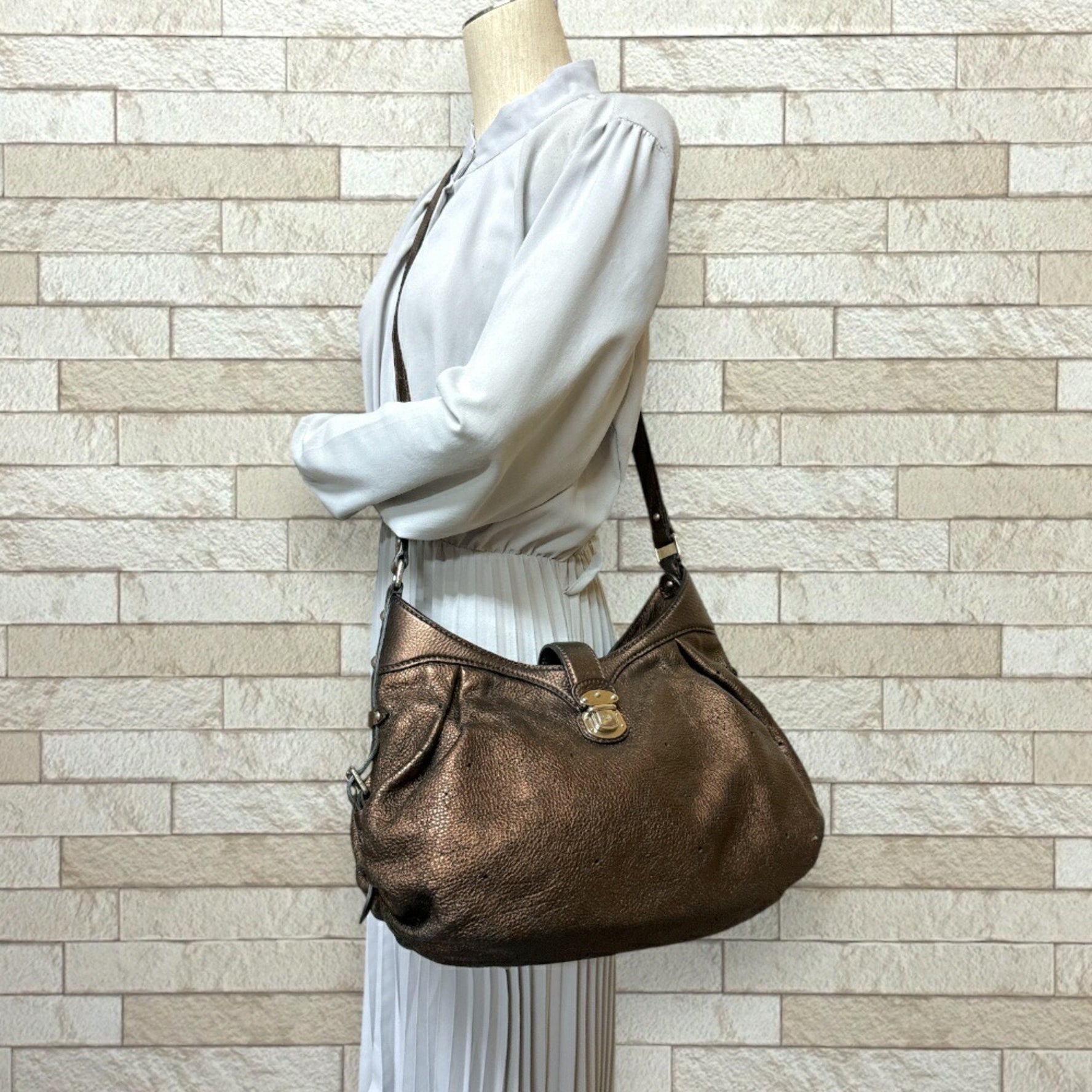 Louis Vuitton XS Monogram Mahina Shoulder Bag