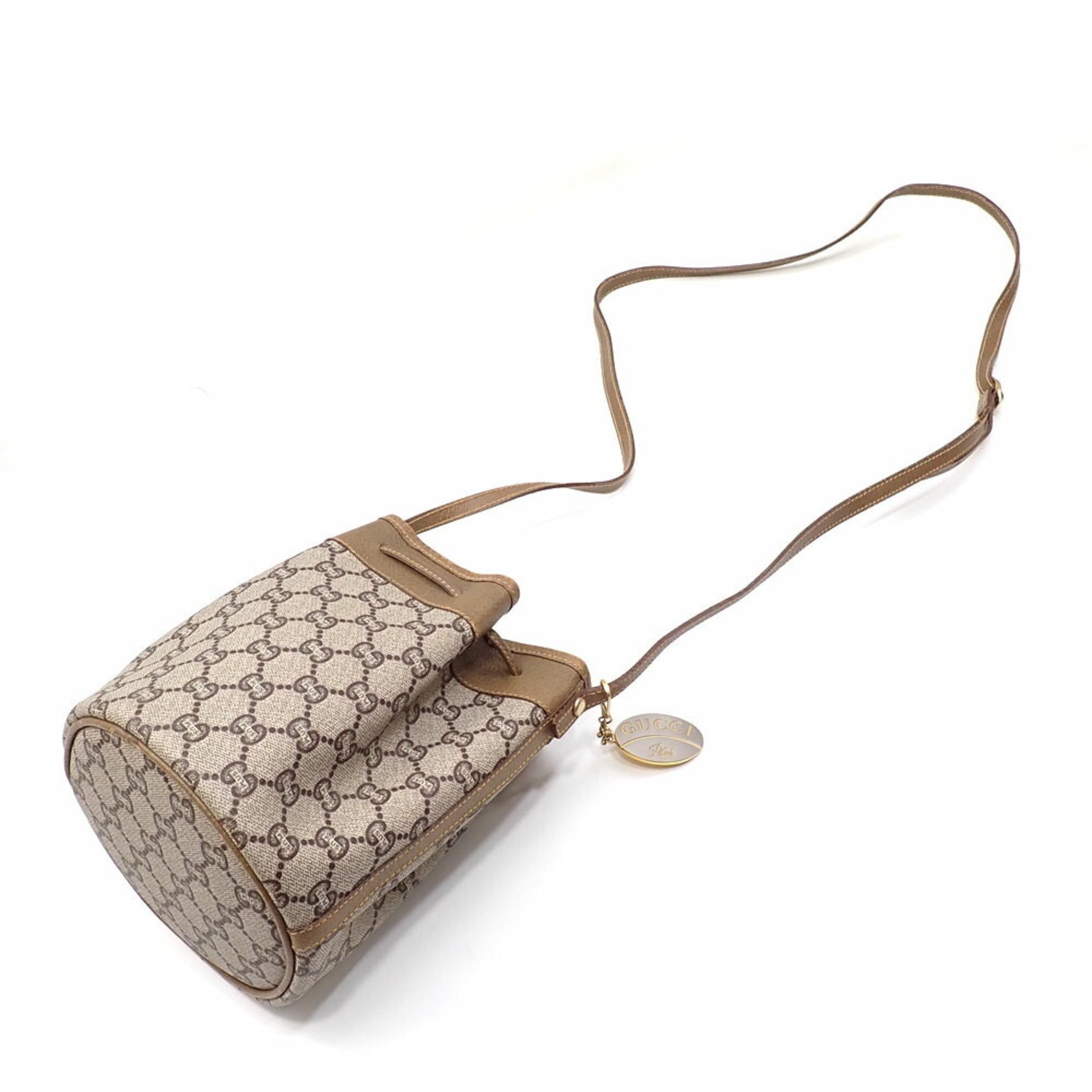 Gucci shoulder bag beige, brown, PVC, and leather. Plus.