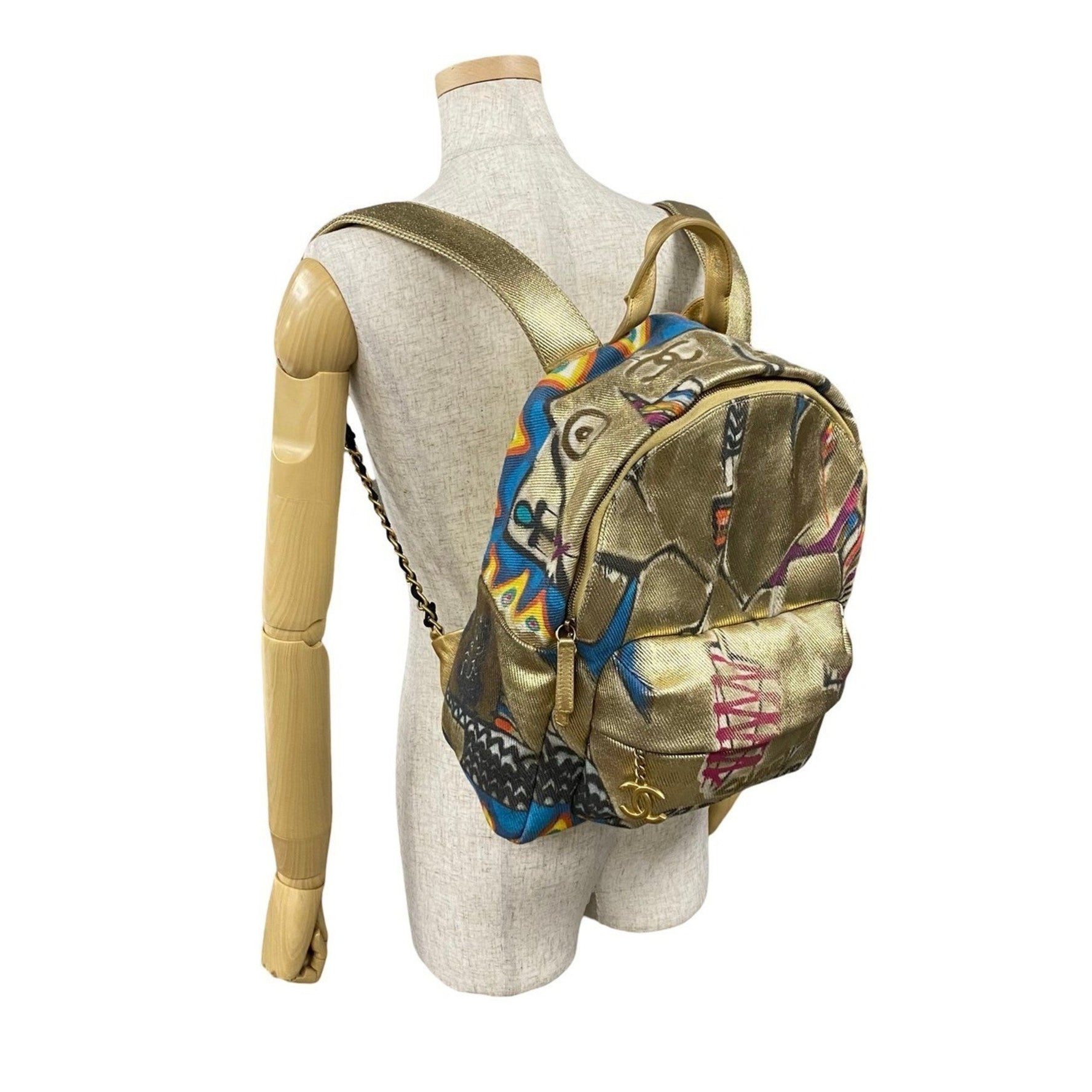 CHANEL Coco Mark Graffiti Coated Canvas Backpack, Gold