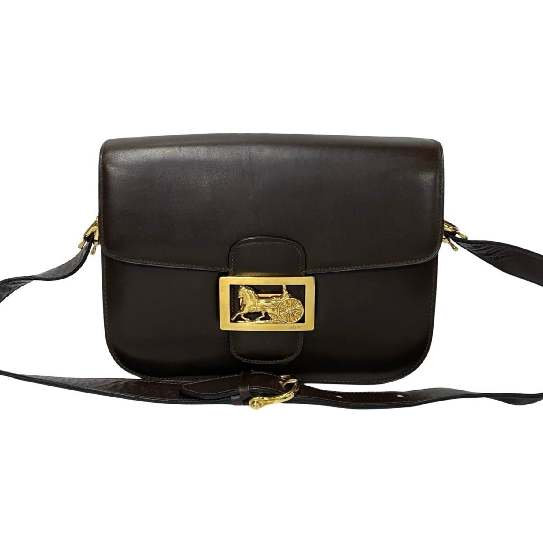 CELINE 107-4 genuine leather shoulder bag with carriage hardware and sacoche in brown.
