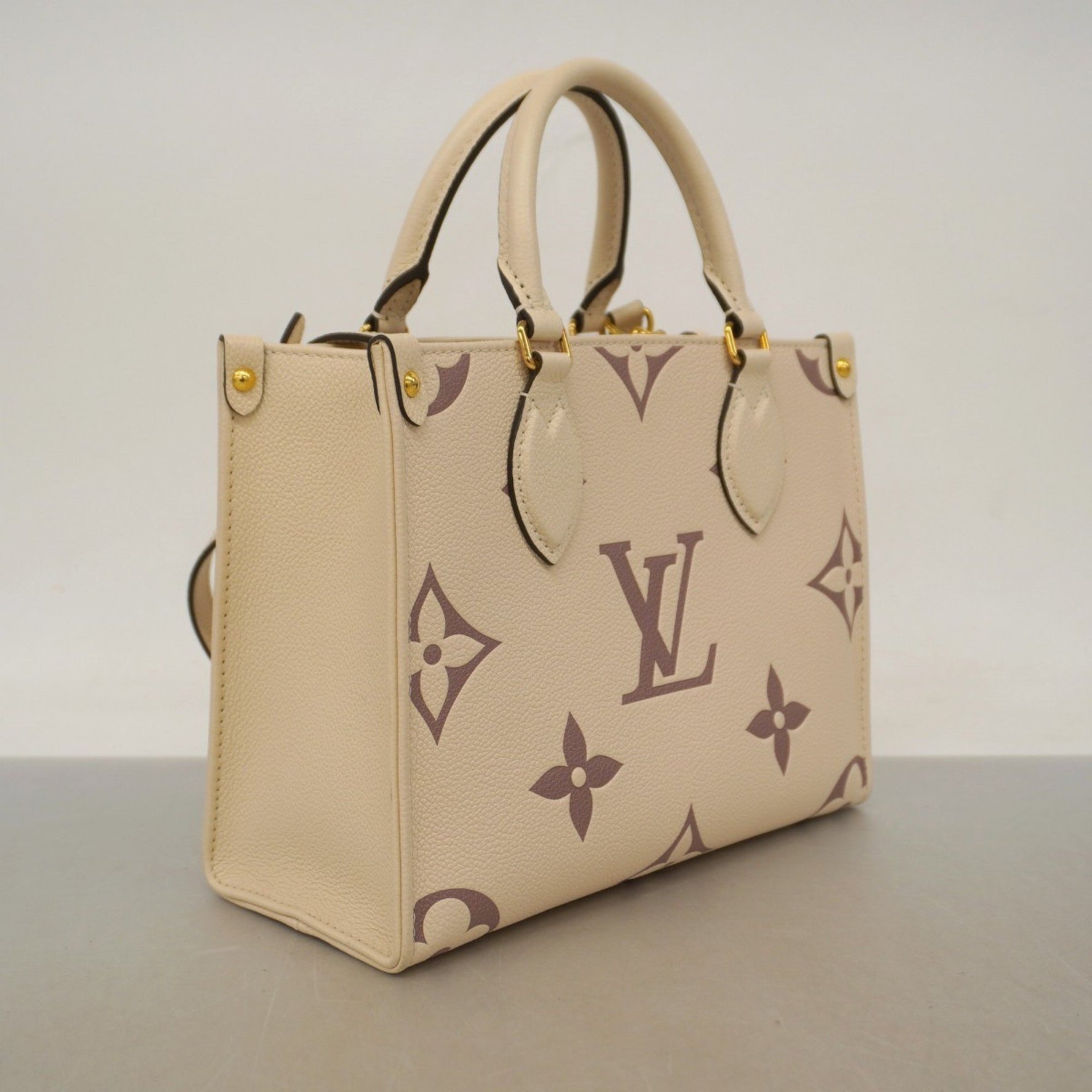 Louis Vuitton Monogram Empreinte Two-Tone On-the-Go PM Handbag Crème Bois de Rose Bag