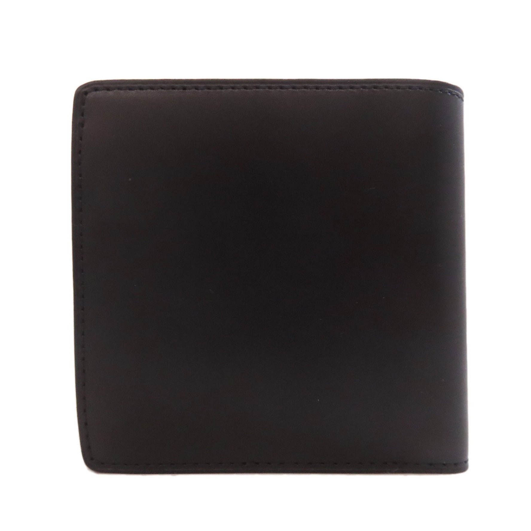 Louis Vuitton Portefeuille Marco Nomade Bifold Wallet in Leather
